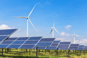 solar panels and wind turbines generating electricity representing 'zombie' projects