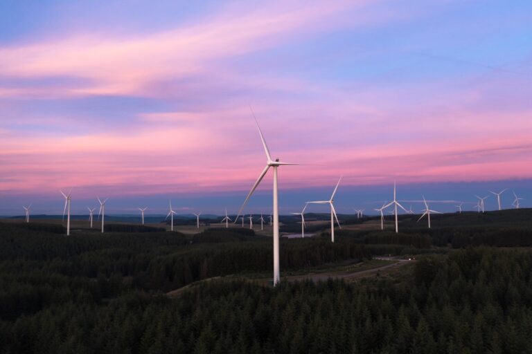 wind turbines at dusk representing uk climate strategy