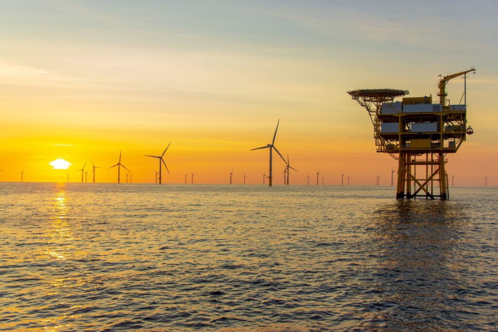 sunset at the North Sea offshore wind farm representing windfall tax
