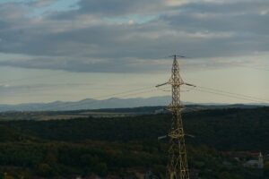 electric transmission tower in the countryside representing electrification