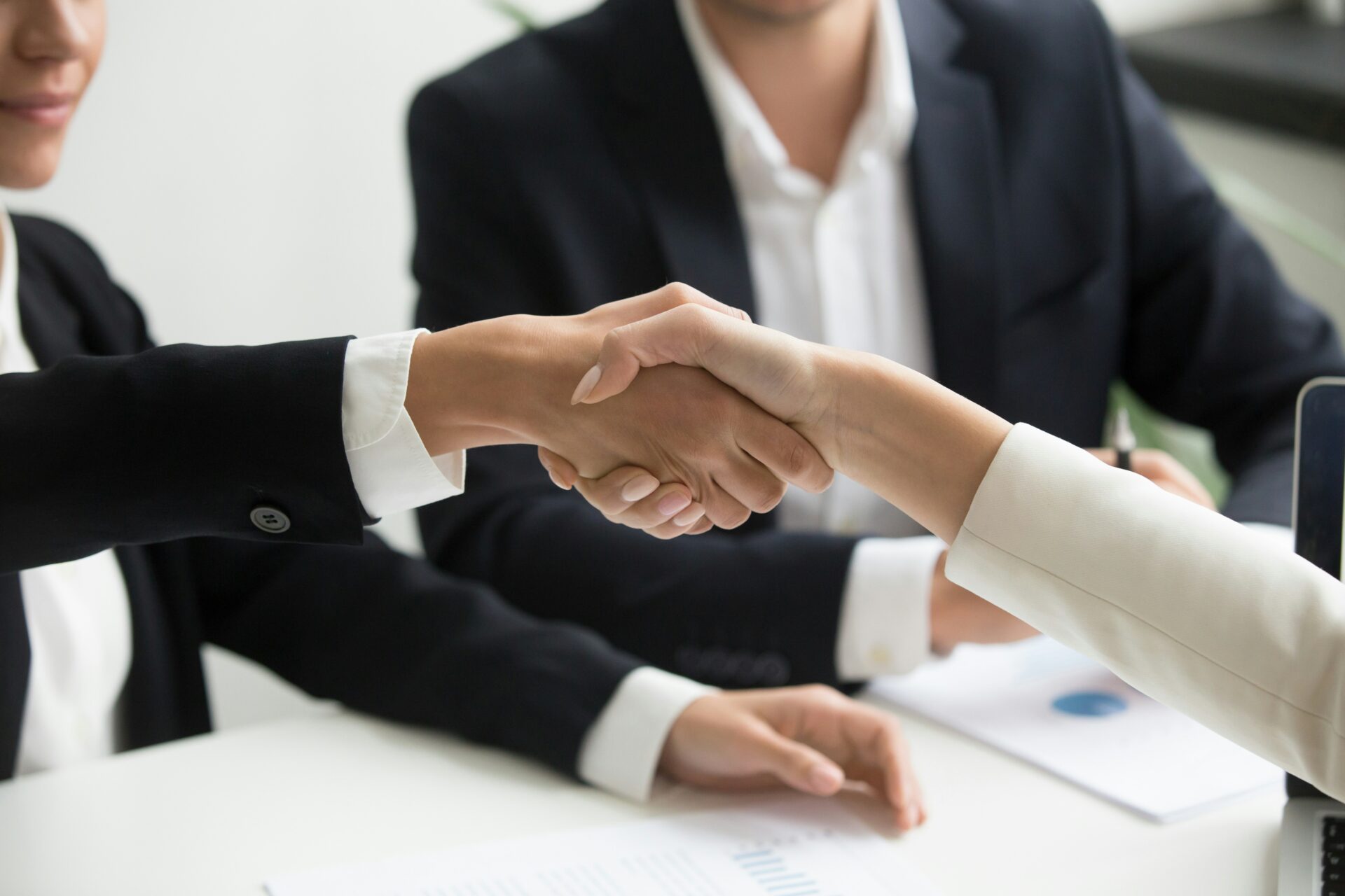 business handshake representing an energy consultancy agreement