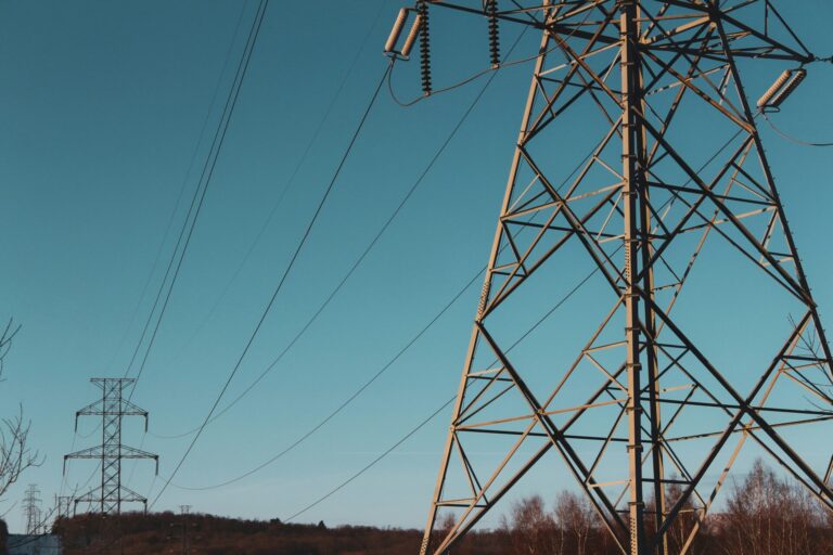 pylons against blue sky representing MHHS